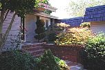 front steps and entrance garden